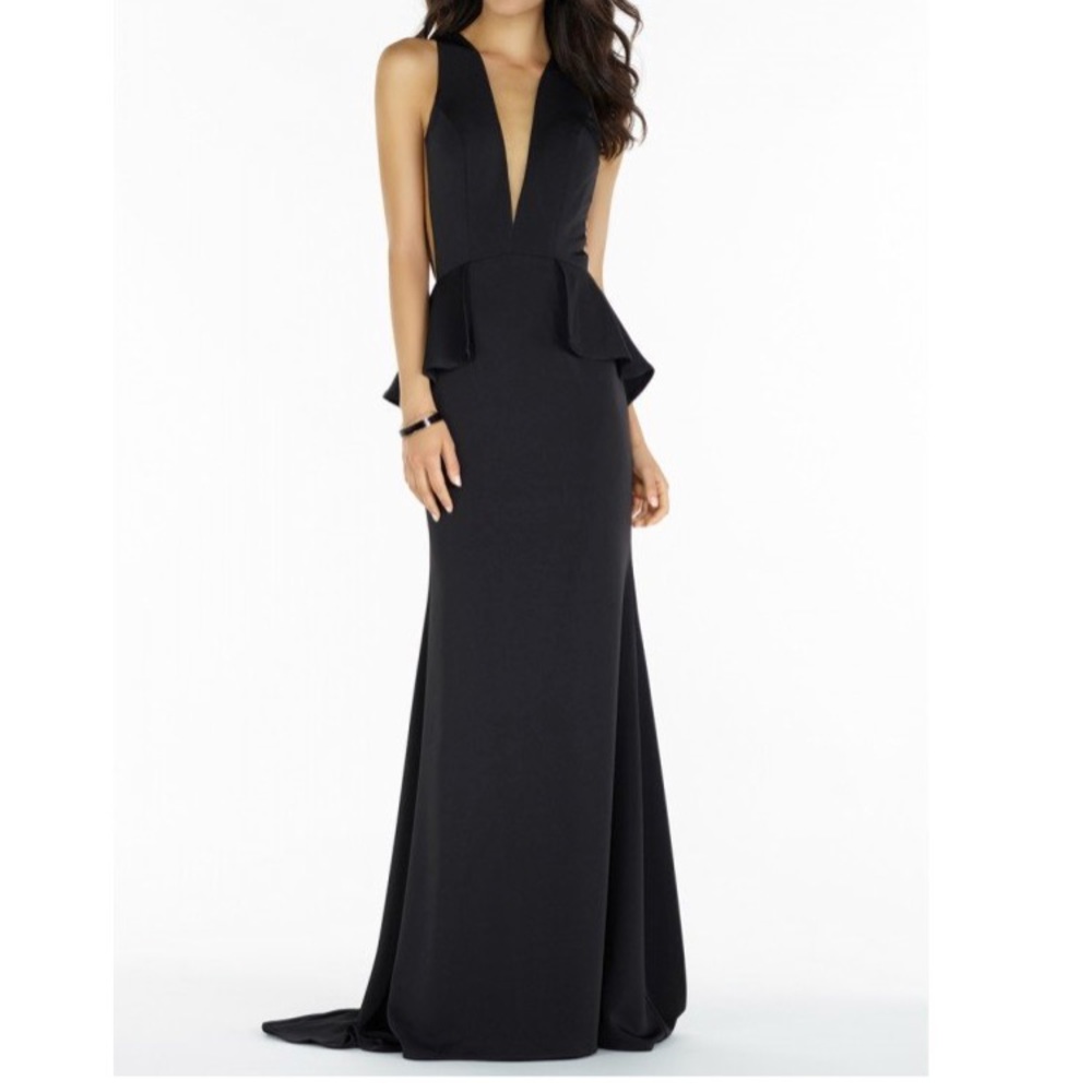 Black gown w/ illusion plunge neckline &peplum top